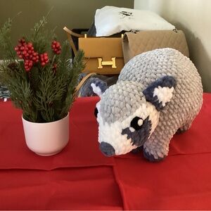 Homemade crochet raccoon